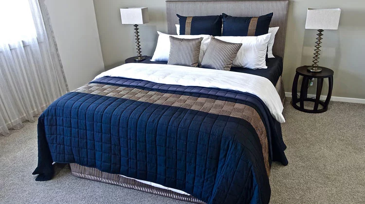 A perfection of White and Gray with Textured Bed A perfection of White and Gray with Textured Bed