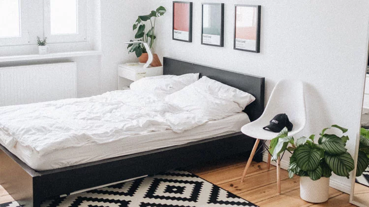 Black Platform Bed with White Mattress inside Bedroom