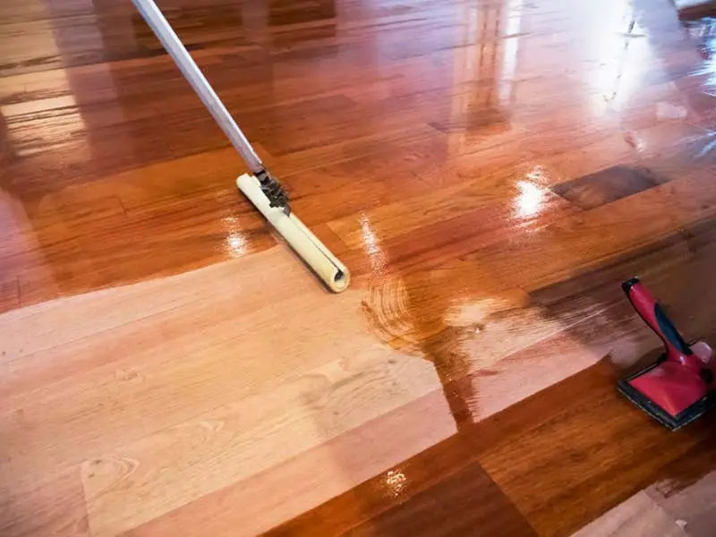 Applying-Floor-Finish-After-Sanding-Hardwood-Floors