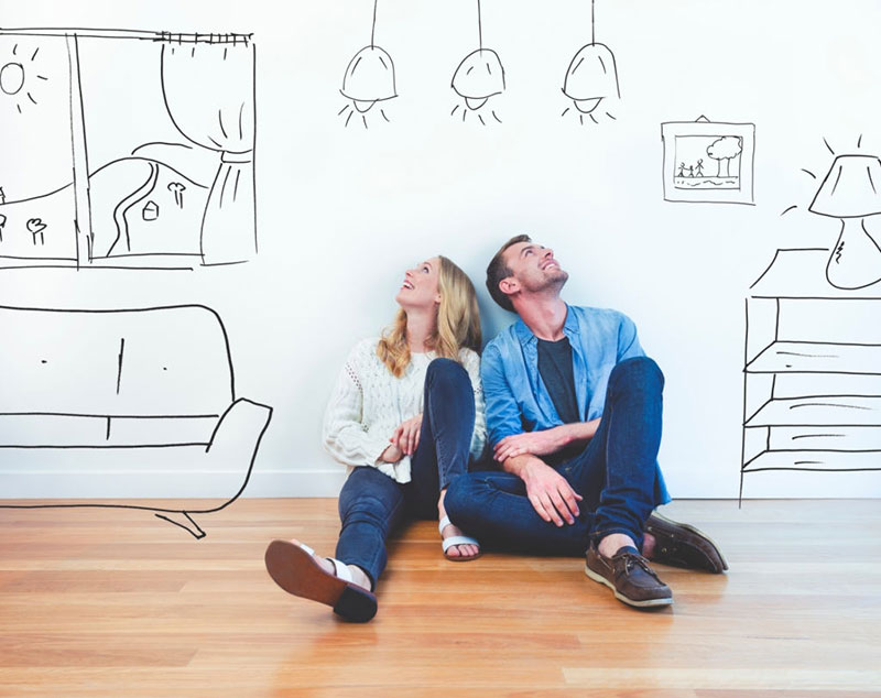 Couple-dreaming-of-their-new-house-decoration
