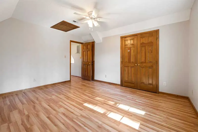 Empty-Room-with-Wooden-Flooring-and-Doors